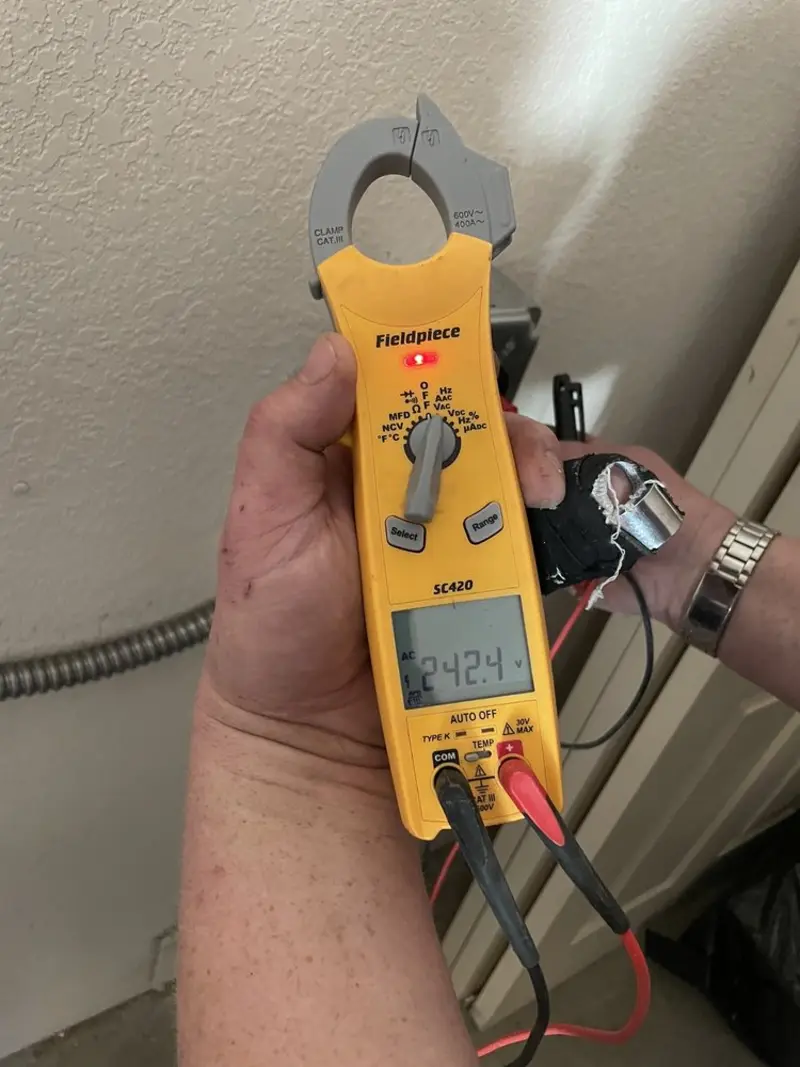 Voltage testing with clamp meter during Ceiling Fan Installation in Tremonton